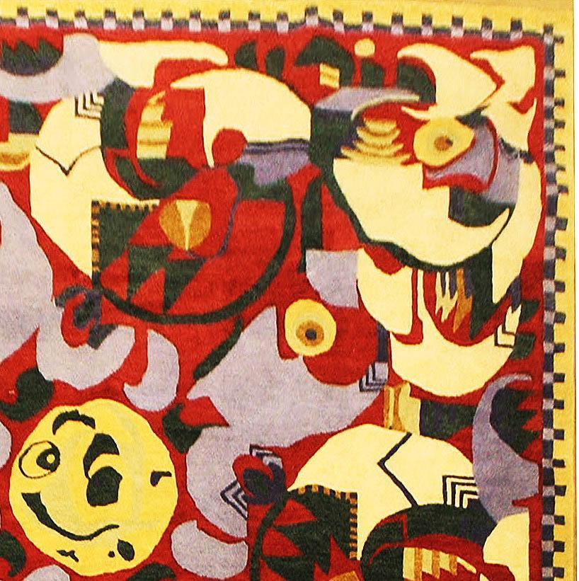 Close-up of handmade reproduction rugs showing hand-knotted wool detail in modern Art Deco design
