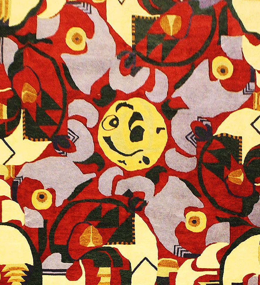 Close-up of handmade reproduction rugs showing hand-knotted wool detail in a modern Art Deco design